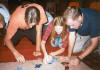 Jen, Ben, and I are scraping some wax off the floor here.  Darn candles...